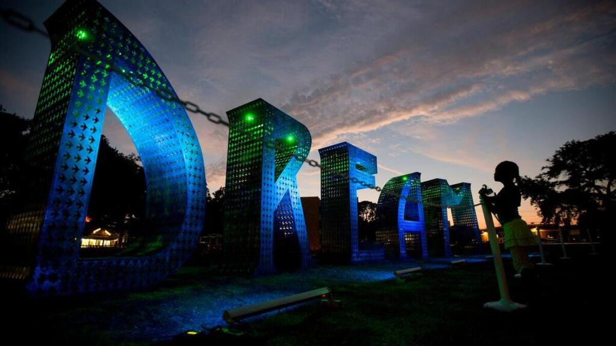 Mia Prowell of Arlington, admired the “DREAM” sculpture in downtown Arlington in 2015.