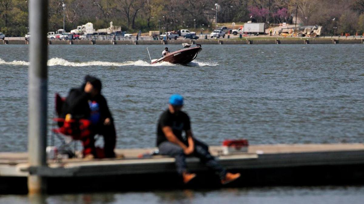 A boater zooms across the Lake Arlington near Richard Simpson Park. The site of the new center will be close to the lake.