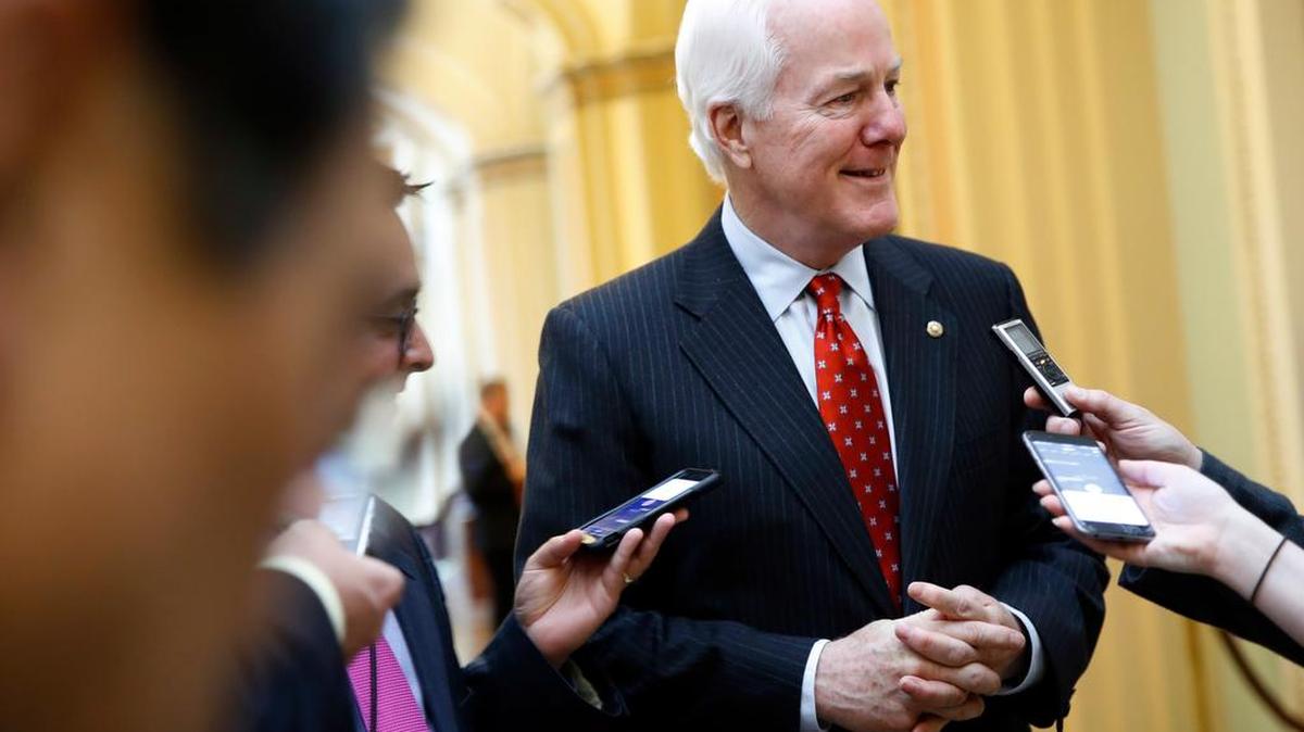 Senate Majority Whip John Cornyn of Texas talks with reporters on Wednesday.