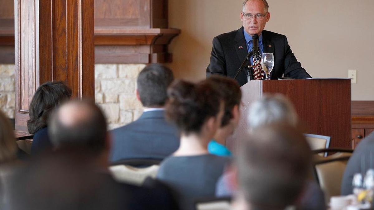 Keller mayor Mark Mathews gives his state of the city presentation during a luncheon at Sky Creek Ranch Golf Club in Keller on Thursday, January 14, 2016.