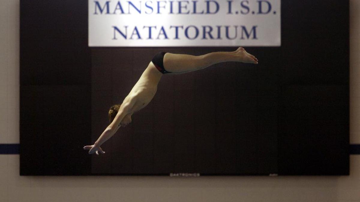 A Timberview sophomore practices his diving at MISD Natatorium in 2006. The Natatorium was part of a $226.1 million bond package voters approved in 2003.
