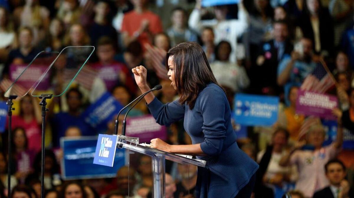 First lady Michelle Obama speaks during a campaign rally for Democratic presidential candidate Hillary Clinton Thursday, Oct. 13, 2016, in Manchester, N.H.