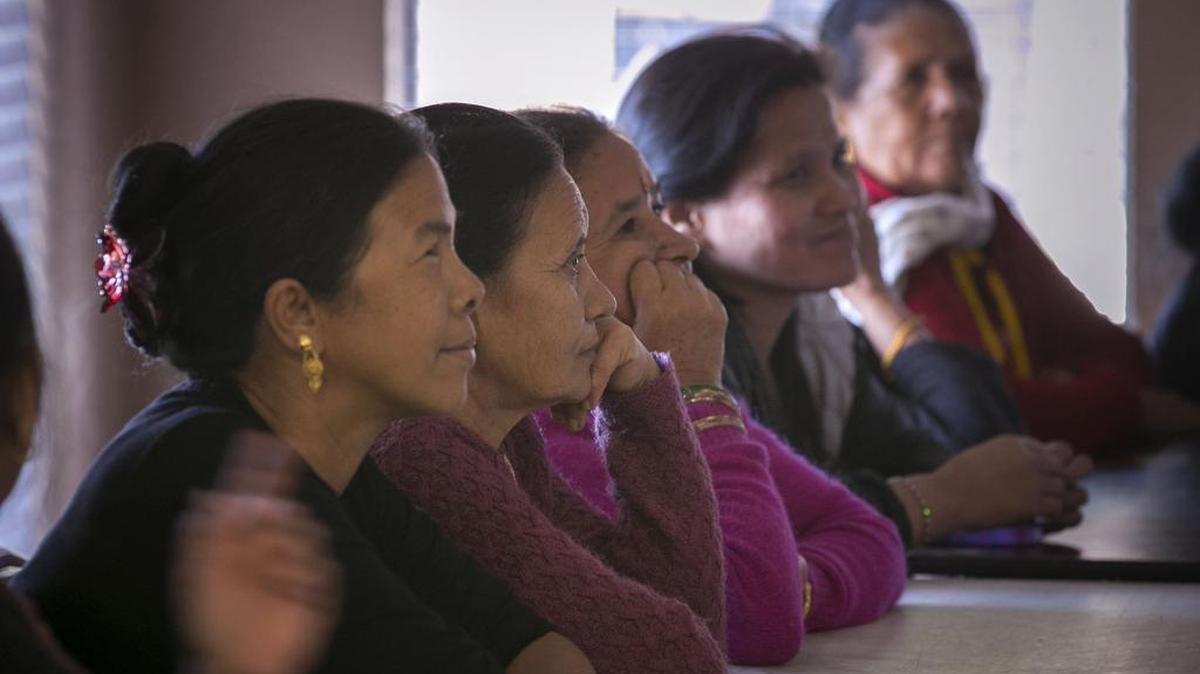 Radhika Subedi teaches a health class for women refugees Oct. 29 at their apartment complex in southeast Fort Worth.