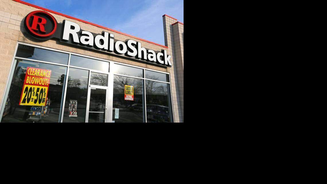 
The Radio Shack store on West Berry Street with a clearance sale sign in the window. 
