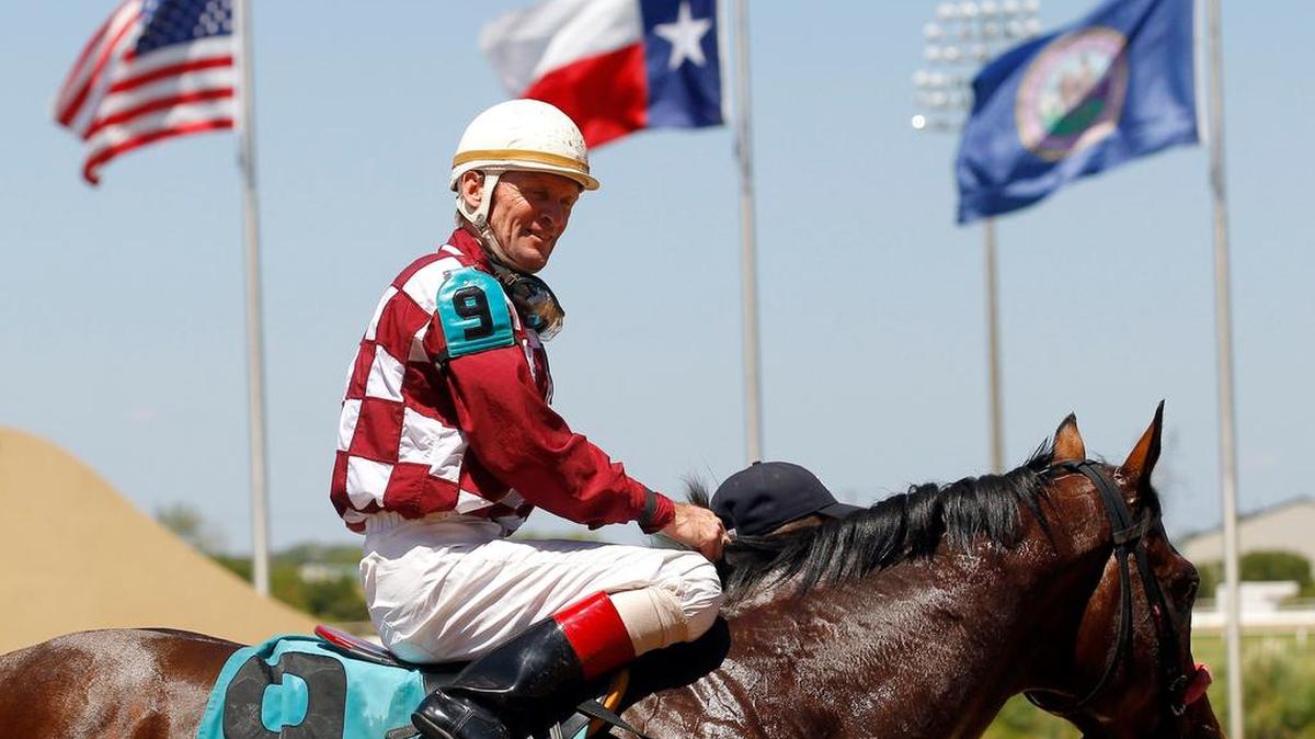 Jockey Cliff Berry, atop Chitaurus, smiles after a win July 19 at Lone Star Park in Grand Prairie.