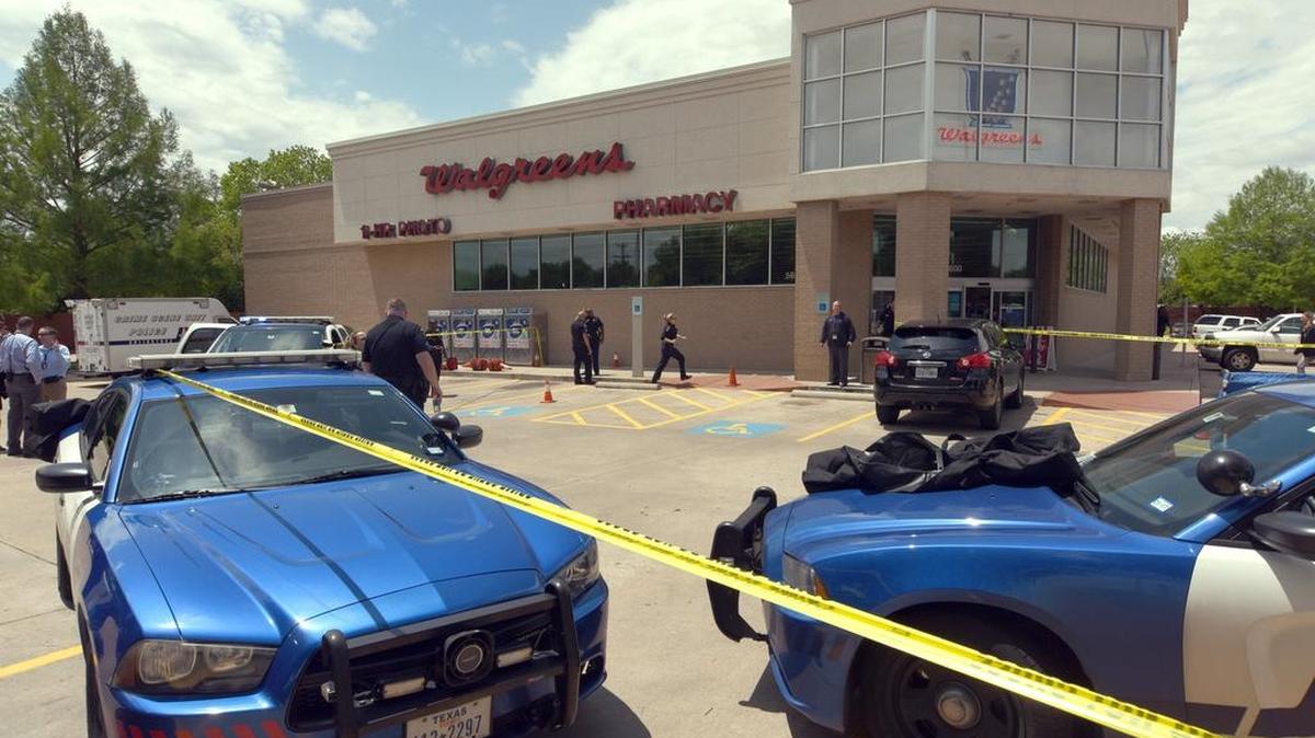 Police tape marks off the scene May 2 outside an Arlington Walgreens where Anthony Antell Jr. was killed.