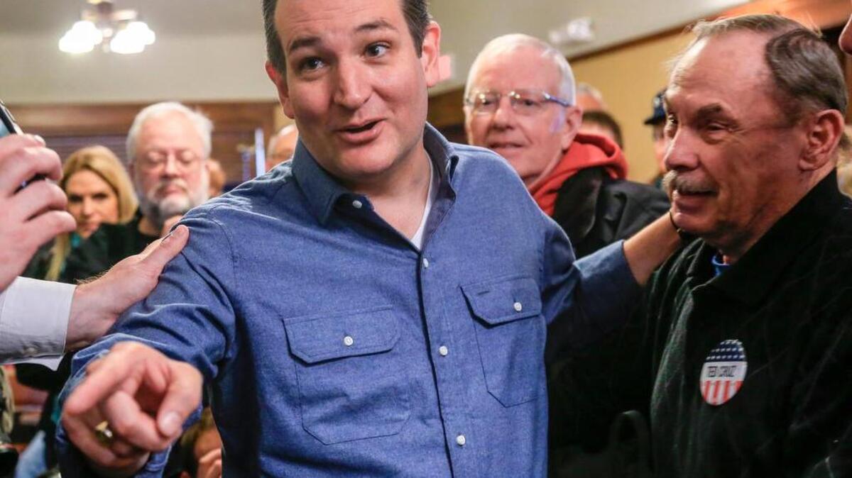 Republican Presidential candidate Sen. Ted Cruz of Texas meets with supporters Tuesday in Iowa.