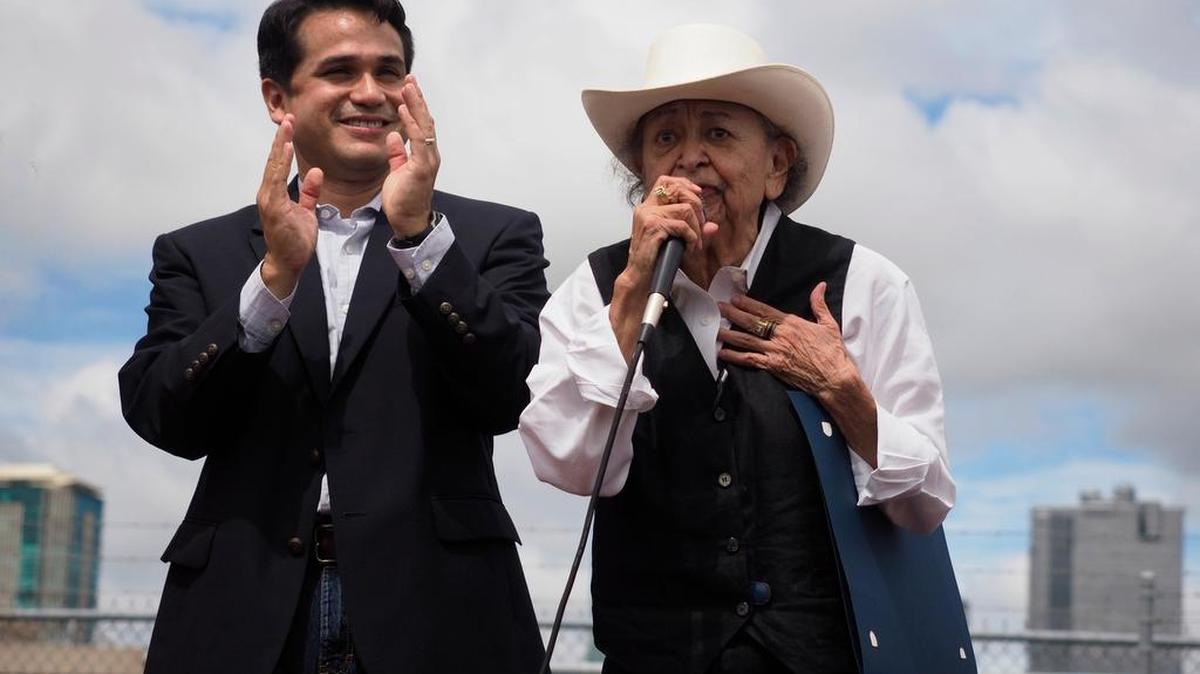 Fort Worth Zoning Commission vice-chair Carlos Flores, left, congratulates parade organizer Juanita Salinas, who is stepping down after this, her 51st parade, at the 16 de Septiembre Mexican Independence Day Parade in 2016.