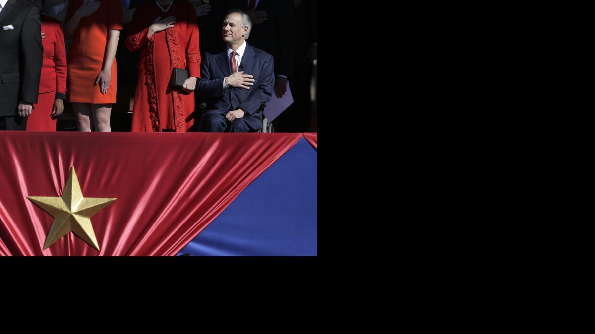 
Gov. Greg Abbott, right, at his inauguration ceremony Tuesday in Austin. 
