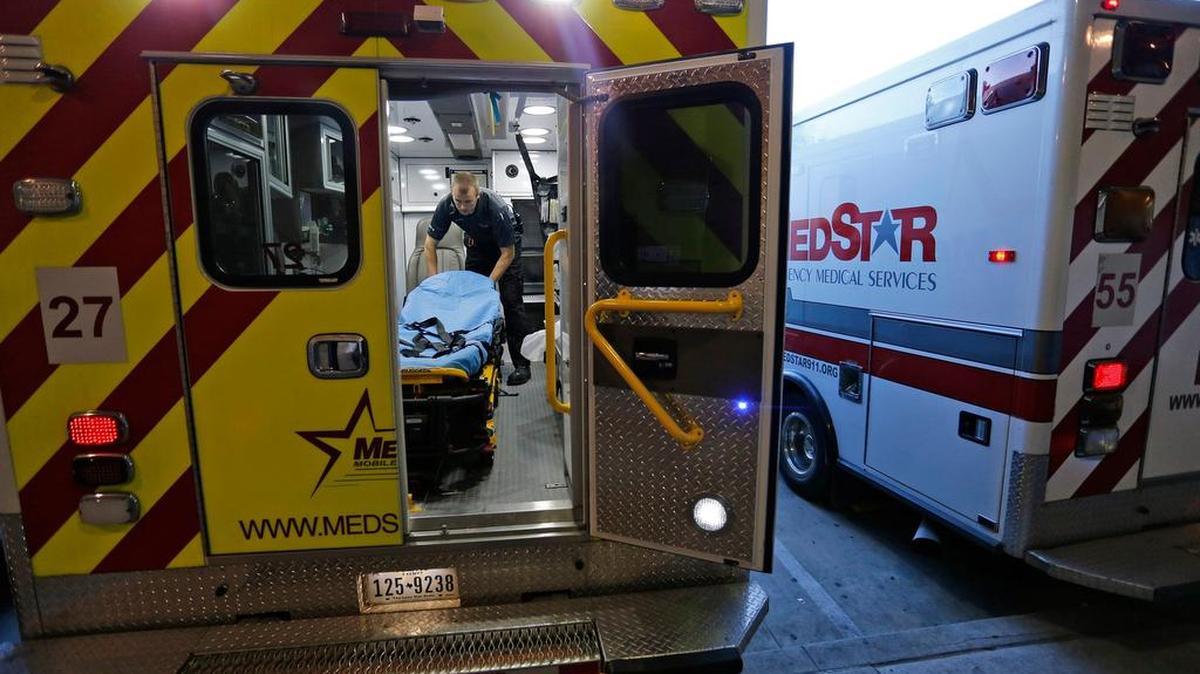 Medics re-stocking ambulances after runs at the JPS Emergency Room ambulance entrance. MedStar is the exclusive emergency ambulance service for Fort Worth and many surrounding cities.