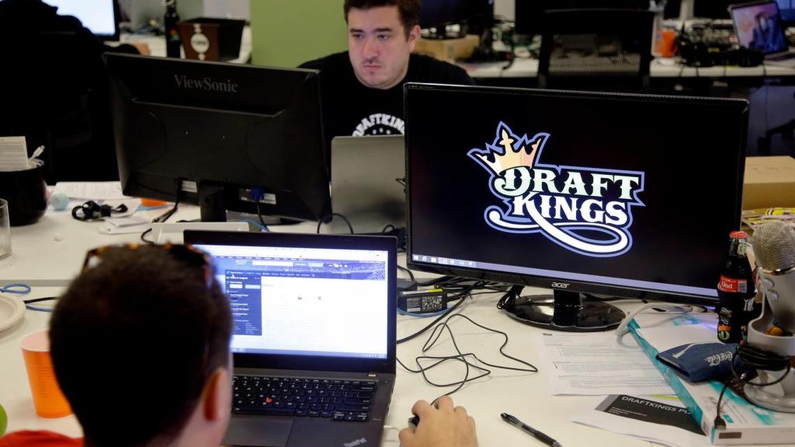 Len Don Diego, marketing manager for content at DraftKings, a daily fantasy sports company, works at his station at the company’s offices in Boston in 2015.