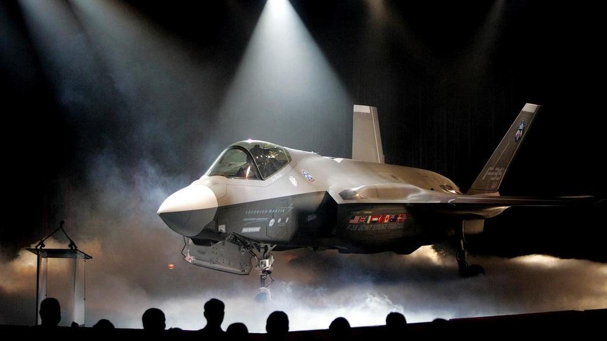 The Lockheed Martin F-35 Joint Strike Fighter is unveiled in a July 2006 ceremony in Fort Worth. Shares of Lockheed Martin fell Monday as President-elect Donald Trump tweeted that making F-35 fighter planes is too costly and that he will cut “billions” in costs for military purchases.
