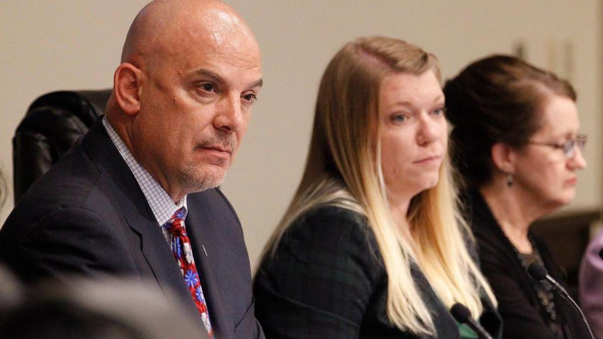 Fort Worth school Superintendent Kent Scribner, Trustee Ashley Paz, center, and executive secretary Faye Daniels listen to comments on transgender guidelines at the June 28 school board meeting.