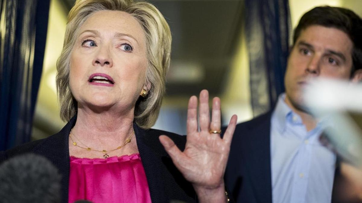 Hillary Clinton takes questions from the press corps aboard her campaign plane bound for Florida on Tuesday.