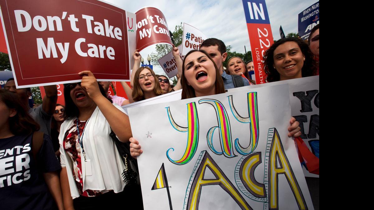
Demonstrators outside the Supreme Court on Thursday celebrated its ruling on the Affordable Care Act. 
