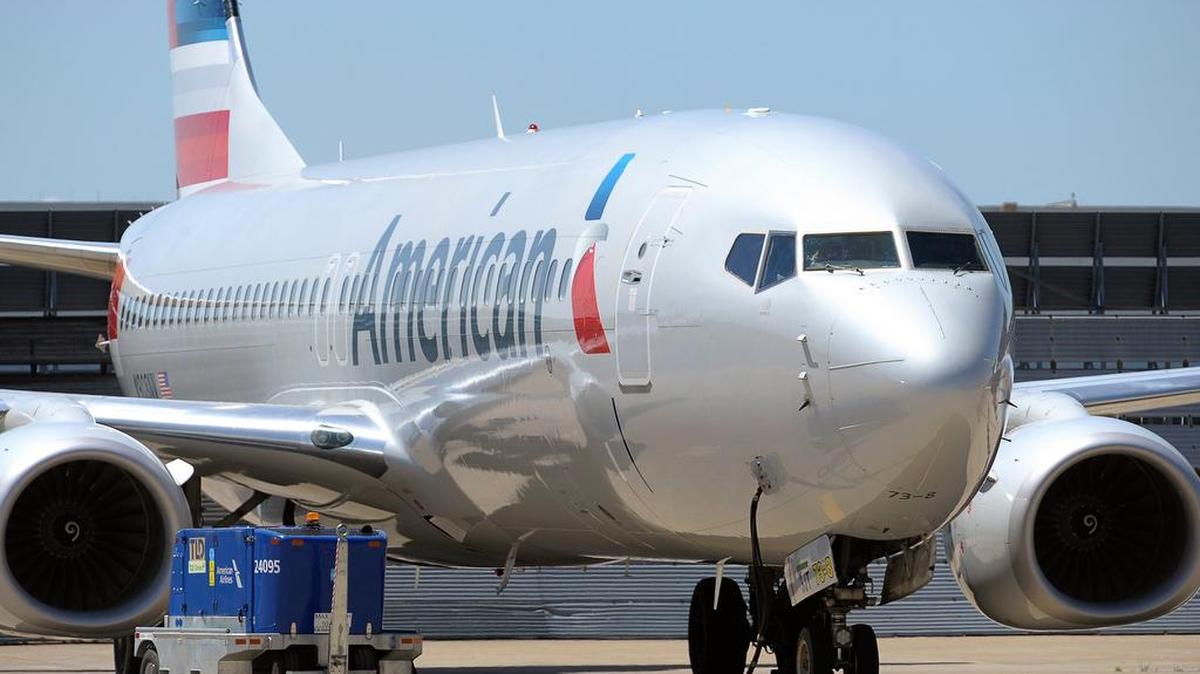 An American Airlines flight attendant confronted a young mother Friday as she boarded a flight from San Francisco to Dallas-Fort Worth.