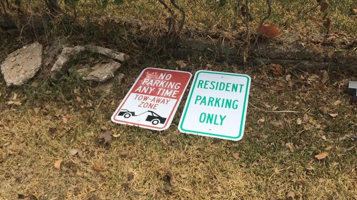 City workers removed No Parking signs installed illegally on W. Devitt Drive near TCU.