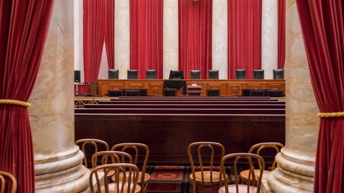 Justice Antonin Scalias courtroom chair at the Supreme Court has been draped in black to mark his death as part of a tradition that dates to the 19th century, in Washington, Tuesday, Feb. 16, 2016. Scalia died Saturday at age 79. He joined the court in 1986 and was its longest-serving justice.