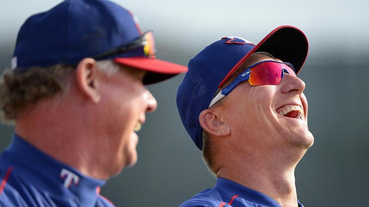 Former Texas Rangers manager Jeff Banister and coach Steve Buechele