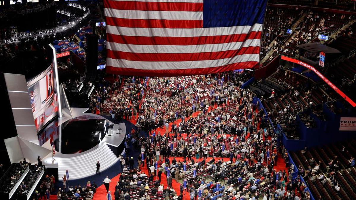 Delegates gather during first day of the Republican National Convention in Cleveland, Monday, July 18, 2016.