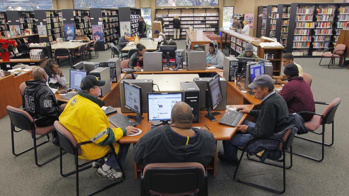 Patrons at the Ridglea Branch of the Fort Worth Public Library