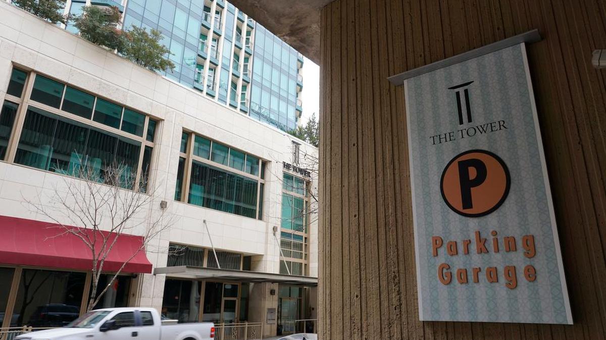 Owners of the Tower Garage downtown seek an agreement to cover free parking.