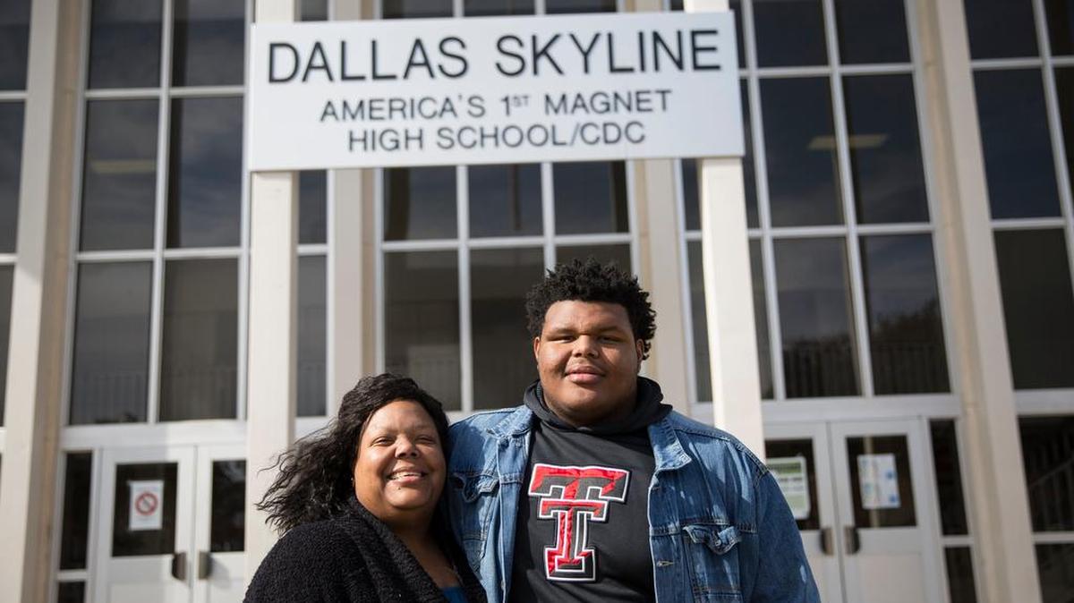 LaKeisha Wallace and her son Joseph Wallace, a 17-year old senior, outside Skyline High School in Dallas on Tuesday, Jan. 26, 2016.