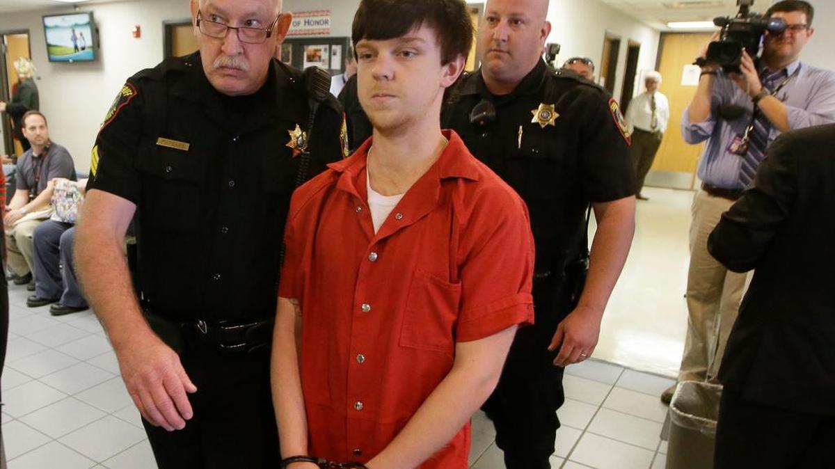 Ethan Couch is led to a juvenile court for a hearing Friday, Feb. 19, 2016, in Fort Worth, Texas. Couch, who used an "affluenza" defense in a fatal drunken-driving wreck is set to appear over whether his case should be transferred to the adult system.