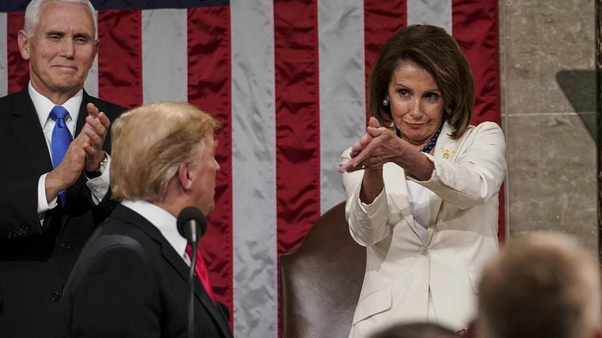 President Donald Trump turns to House speaker Nancy Pelosi of Calif., as he delivers his State of the Union address to a joint session of Congress.