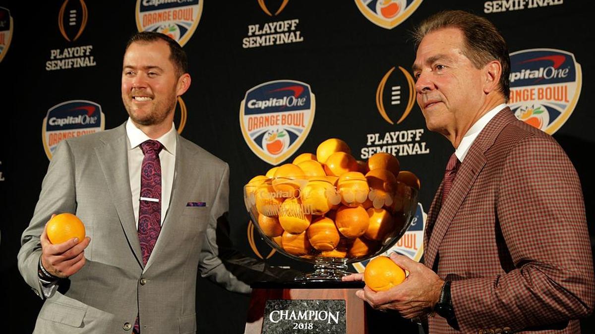 Oklahoma coach Lincoln Riley (left) and Alabama coach Nick Saban, pose for media during a joint press conference on Dec. 28, 2018, ahead of the Orange Bowl.