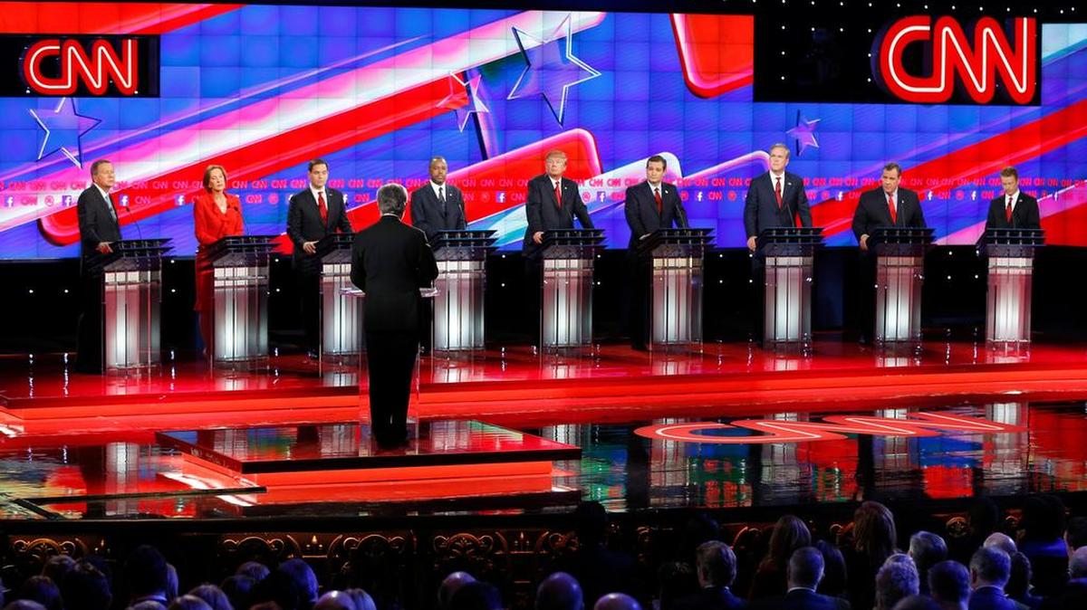Republican presidential candidates, from left, John Kasich, Carly Fiorina, Marco Rubio, Ben Carson, Donald Trump, Ted Cruz, Jeb Bush, Chris Christie, and Rand Paul share the stage with debate moderator Wolf Blitzer during the CNN Republican presidential debate at the Venetian Hotel & Casino on Tuesday.