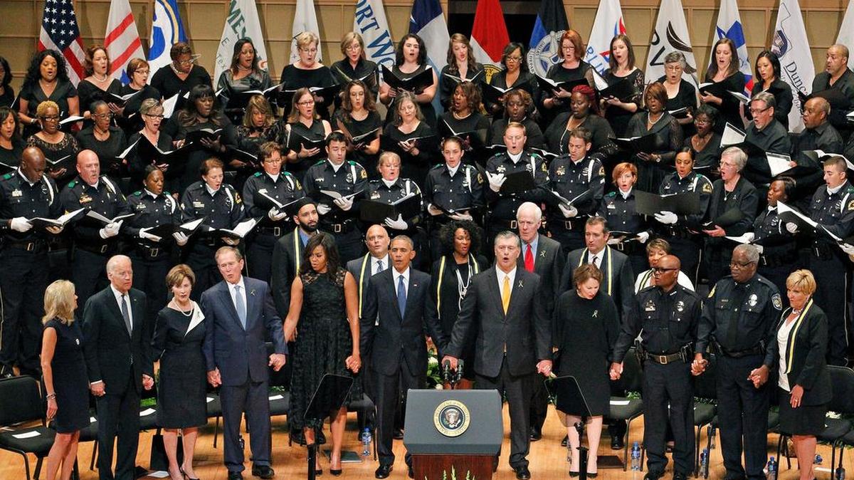 President Barack Obama and other officials at a Dallas police memorial on Tuesday.