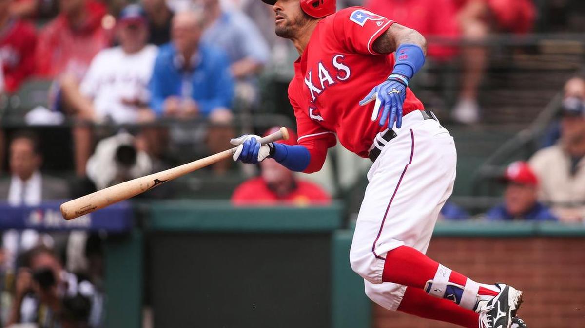Texas Rangers Ian Desmond (20) hits a single to score Nomar Mazara in the 4th inning against the Toronto Blue Jays in Game 2 of the ALDS at Globe Life Park in Arlington TX Friday October 7, 2016.