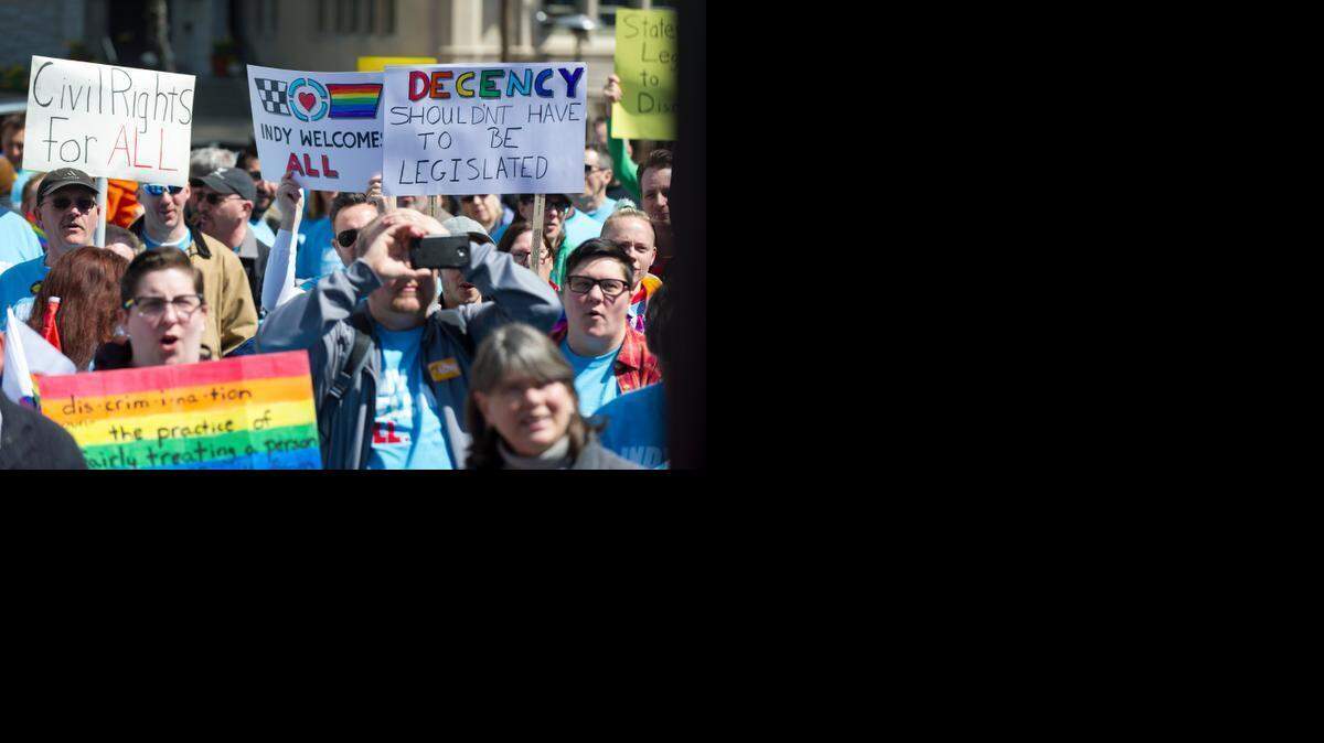 
Opponents of Indiana Senate Bill 101, the Religious Freedom Restoration Act, gather for a demonstration in Indianapolis on Saturday, April 4, 2015 to push for a state law that specifically bars discrimination based on sexual orientation or gender identity. 
