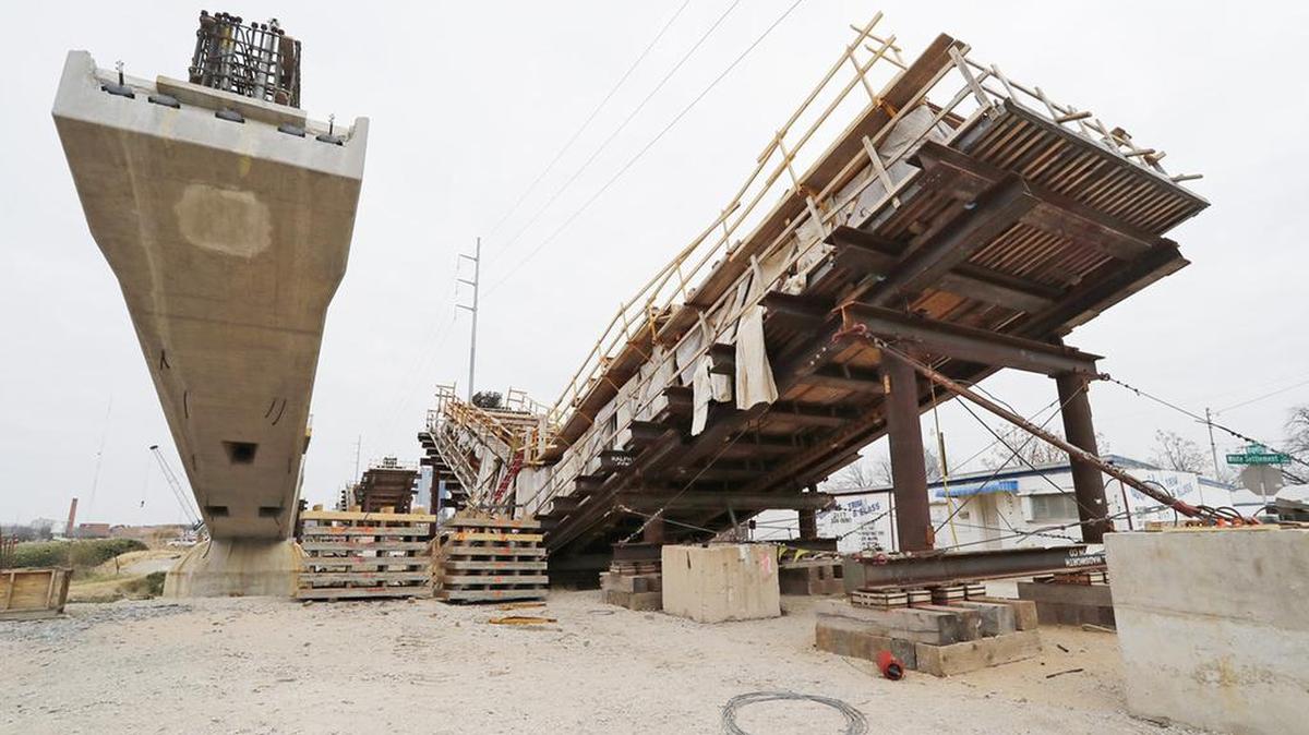 Bridge spans under construction near the intersection of White Settlement and Viola looking east towards Henderson.