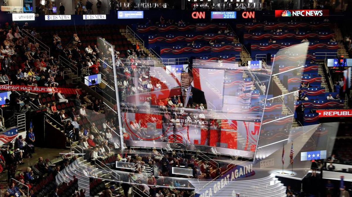 People watch in the stands during first day of the Republican National Convention in Cleveland, Monday, July 18, 2016.