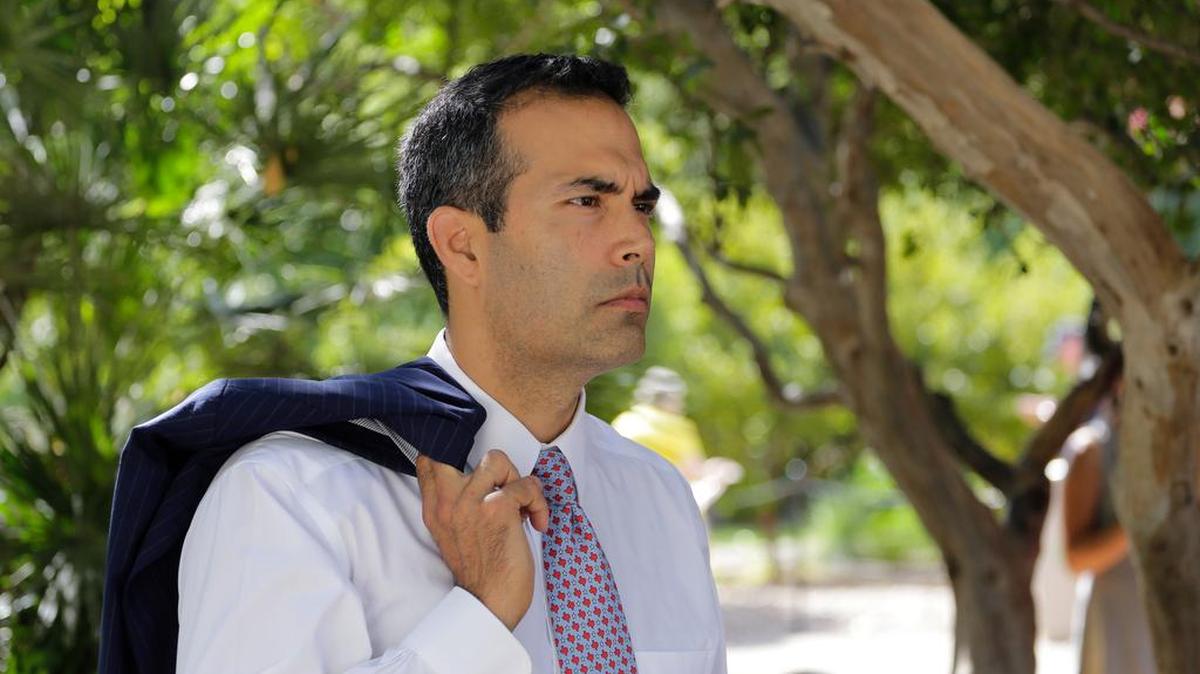 Texas Land Commissioner George P. Bush tours the grounds of the Alamo.