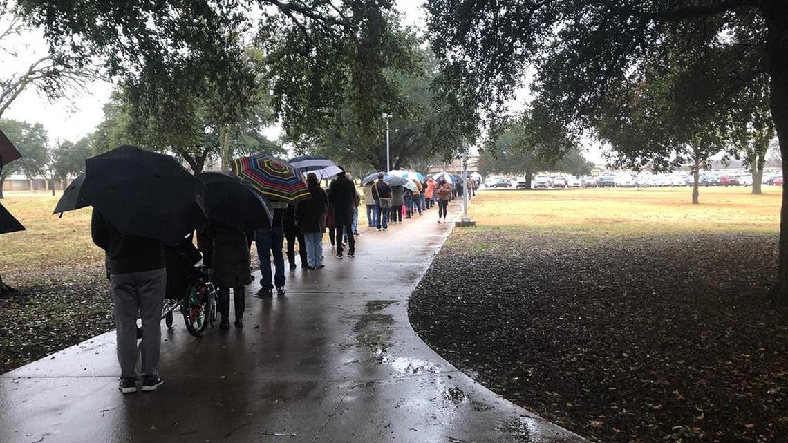 Hundreds of people waiteded in line to receive the COVID-19 vaccination on a rainy day in Fort Worth on Dec. 31. Some waited for more than an hour.