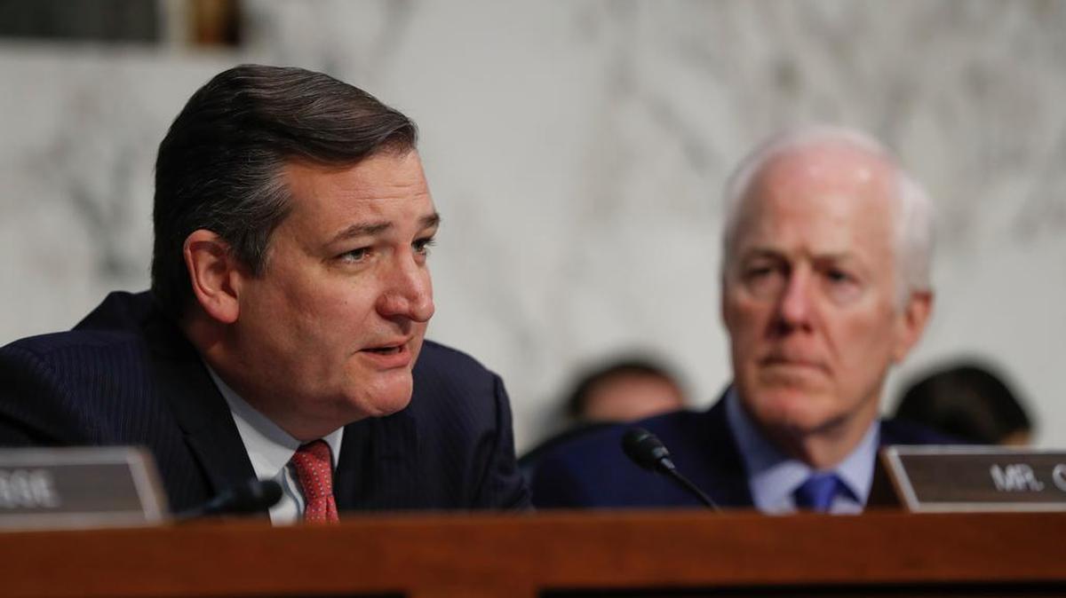 Sen. Ted Cruz, R-Texas, left, questions former Acting Attorney General Sally Yates and former National Intelligence Director James Clapper as Sen. John Cornyn, R-Texas, right, looks on. Yates and Clapper testified Monday before the Senate Judiciary subcommittee on Crime and Terrorism hearing: “Russian Interference in the 2016 United States Election.”