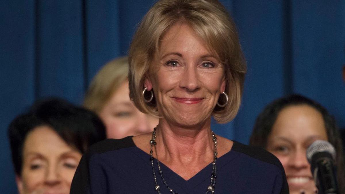 Education Secretary Betsy DeVos smiles Wednesday as she addresses staff at the Education Department.