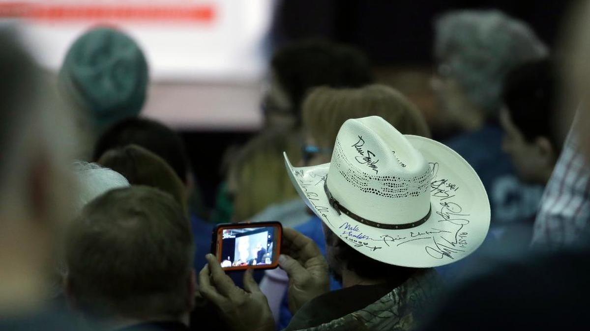 Supporters wait for Republican presidential candidate, Sen. Ted Cruz, R-Texas, at a campaign event at at Iowa State Fairgrounds, Sunday, Jan. 31, 2016, in Des Moines, Iowa.