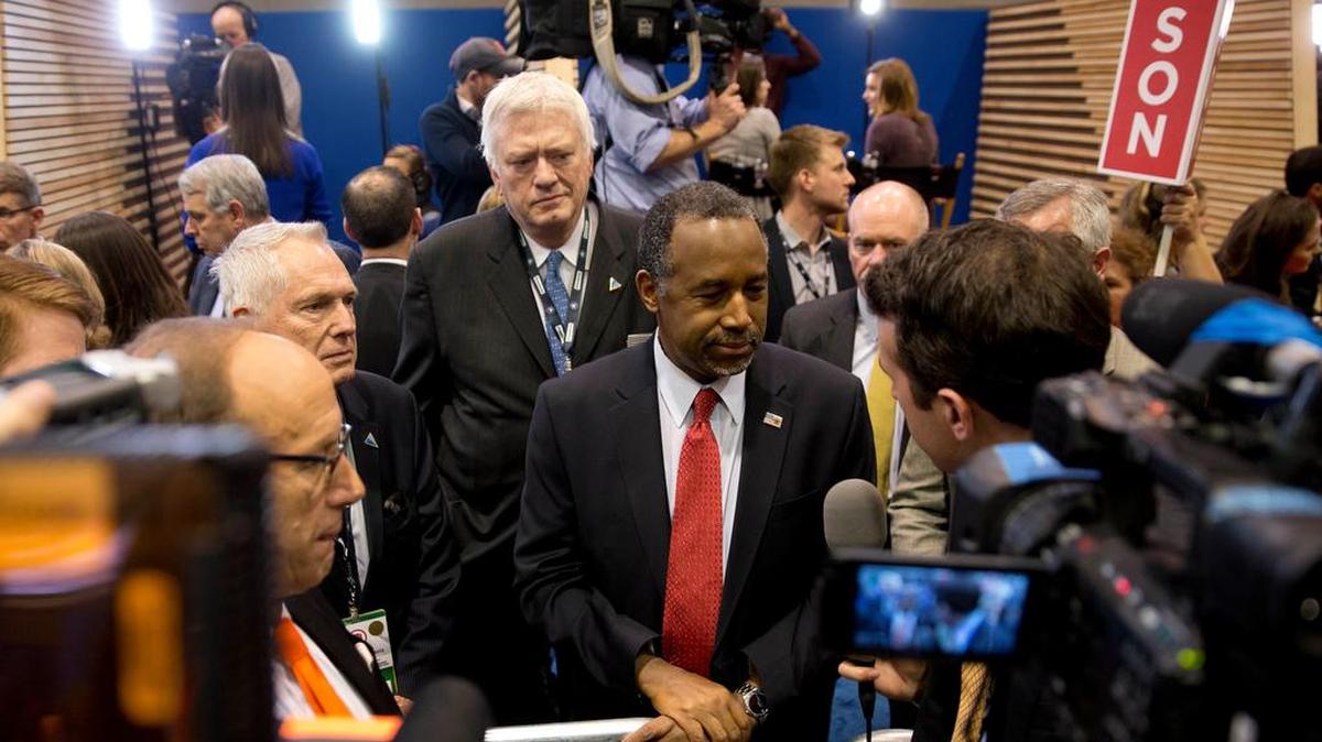 Republican presidential candidate Ben Carson speaks with members of the media after a Republican presidential primary debate hosted by ABC News at the St. Anselm College Saturday, Feb. 6, 2016, in Manchester, N.H.
