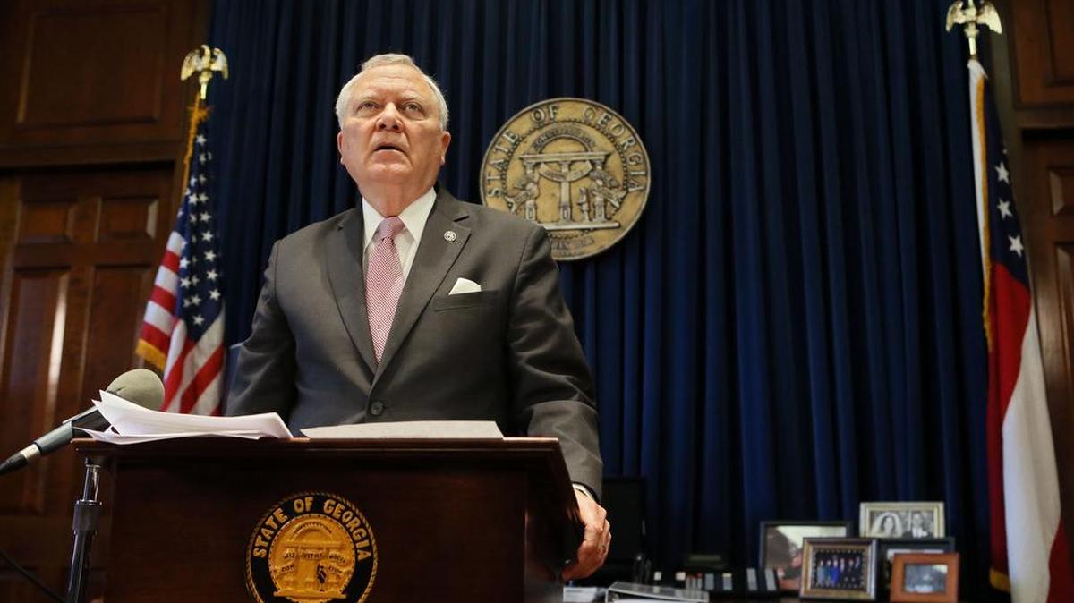 Nathan Deal announces his decision to veto religious liberty legislation at a news conference on March 28, 2016 in the ceremonial office in Atlanta, Ga. He did not answer questions.
