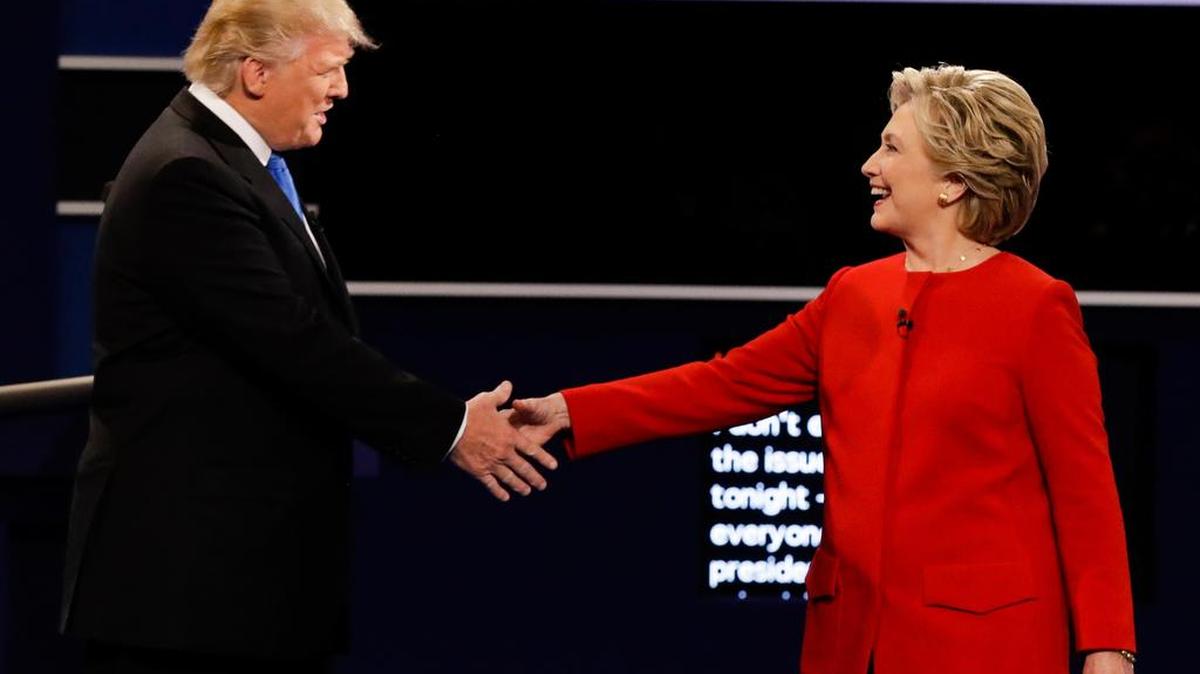 Republican Donald Trump and Democrat Hillary Clinton shake hands at Monday’s presidential debate.