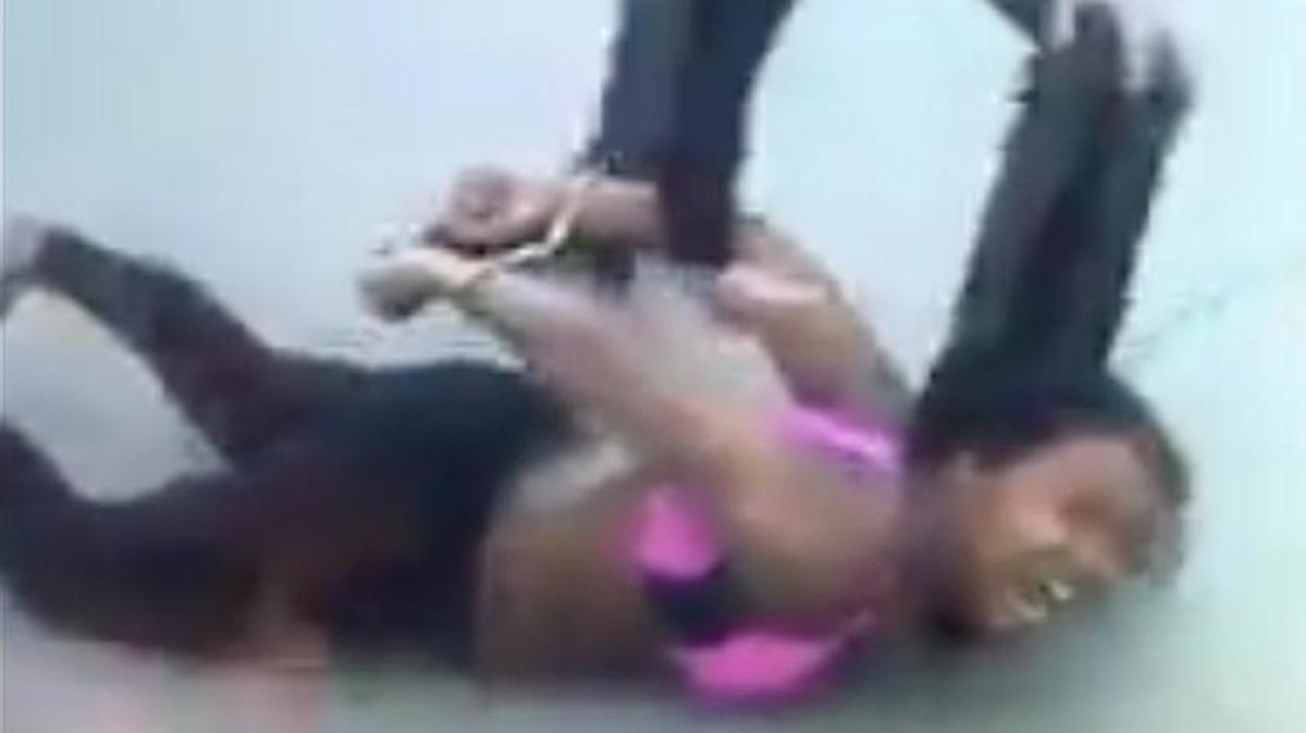 Jacques Craig is arrested by Fort Worth police officer William Martin in this frame grab from video taken by Porsha Craver on Dec. 21.