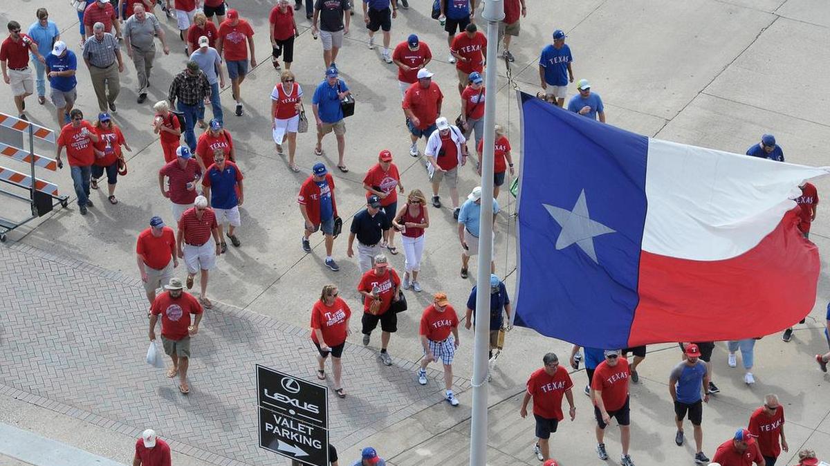 Texas Rangers fans stream into the ballpark as the Texas Rangers play the Toronto Blue Jays in ALDS game 1 at Globe Life Park in Arlington, TX.