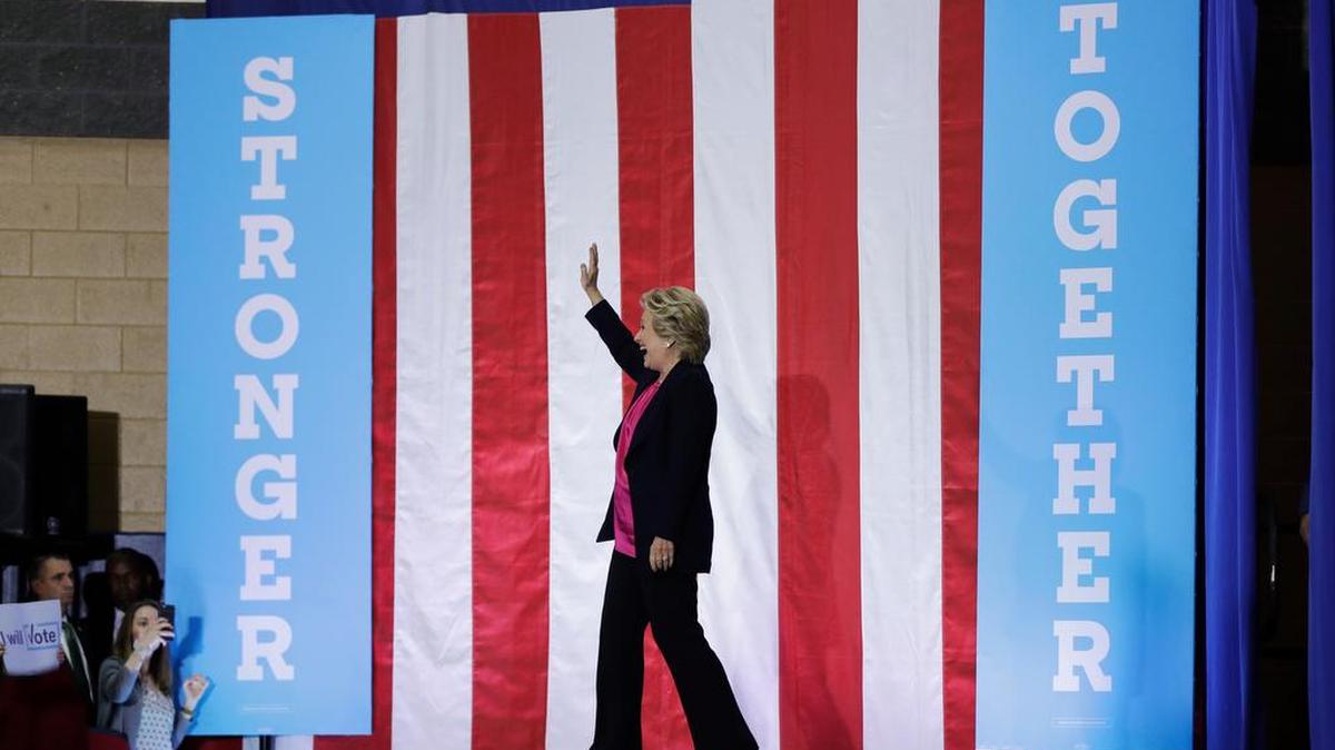 Democratic presidential candidate Hillary Clinton takes the stage at a campaign stop at Wake Technical Community College in Raleigh, N.C., Tuesday.