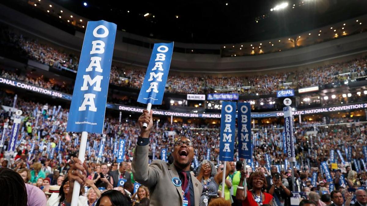 Delegates cheer as President Barack Obama takes the stage during the third day session of the Democratic National Convention in Philadelphia, Wednesday, July 27, 2016.