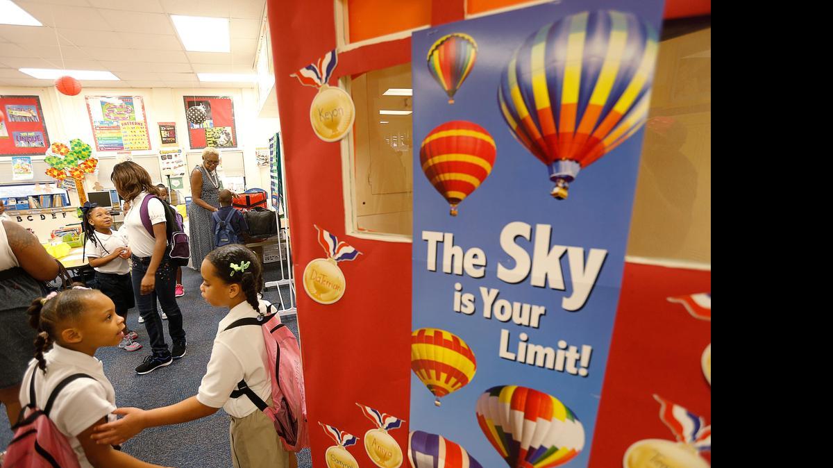 
Students enter their first grade classroom at Morningside Elementary School in Fort Worth. 
