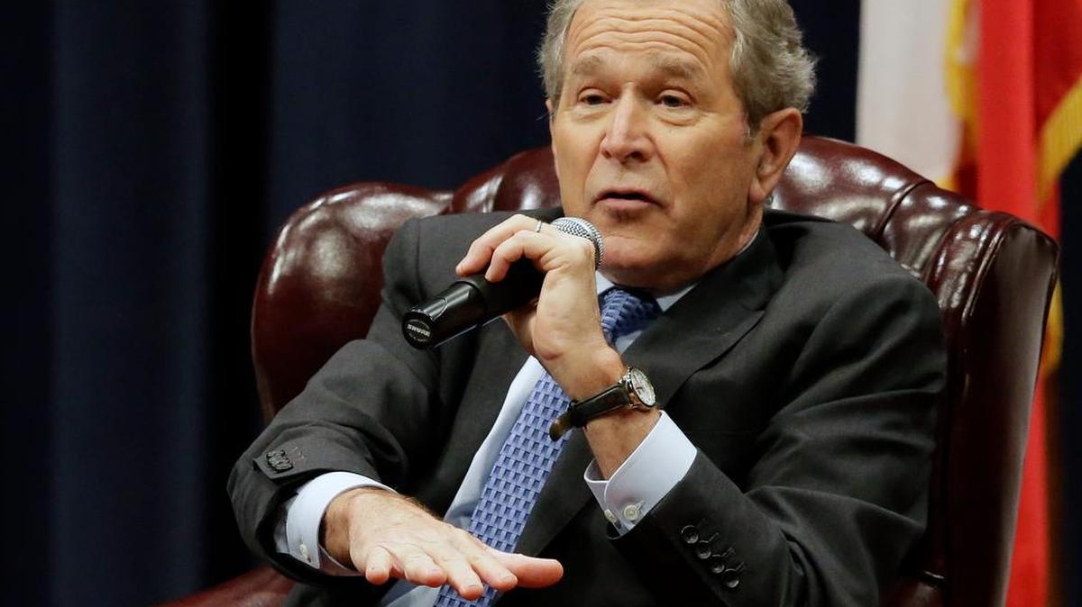 Former President George W. Bush discusses his new book "41: A Portrait of My Father" at his father's George H.W. Bush Presidential Library, Tuesday, Nov. 11, 2014, in College Station, Texas.